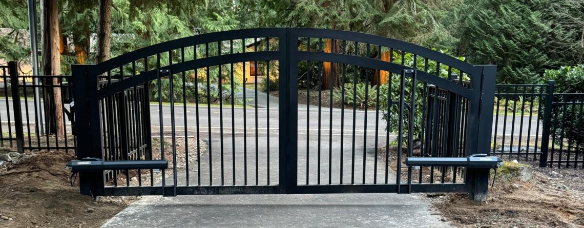 Black arched automated gate installed in Bellevue by Fences & Gates Pro and Custom Railings WA